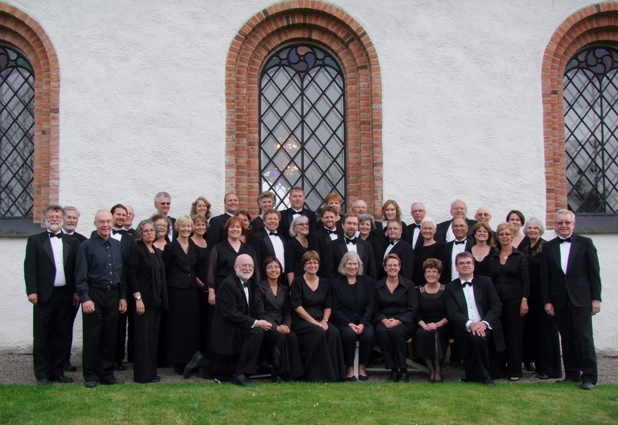 colour photo of GCC standing outside a church